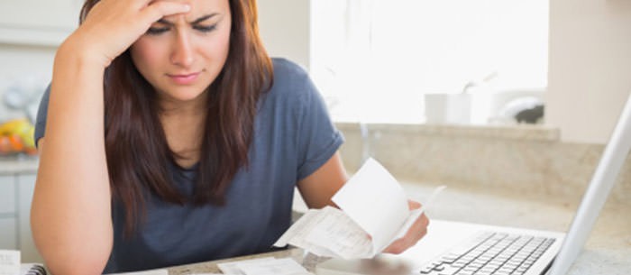 Worried woman with laptop